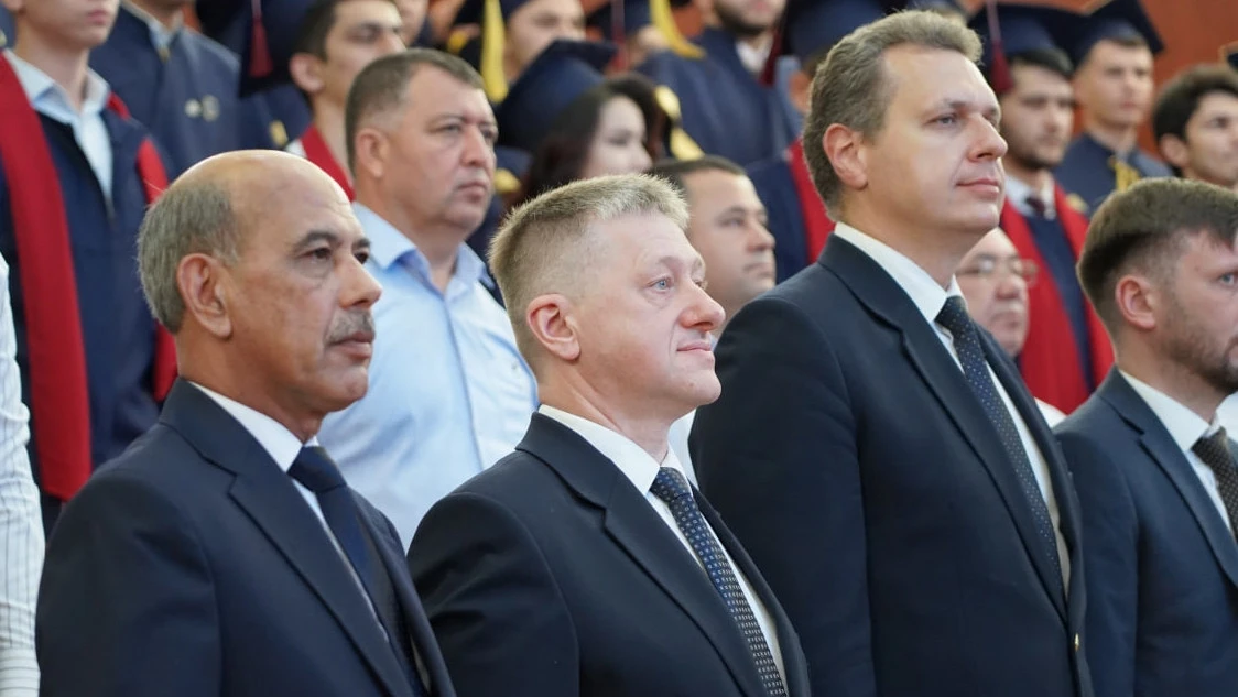 T. Teshabaev, Y. Romanovsky and Y. Golubev at the graduation ceremony