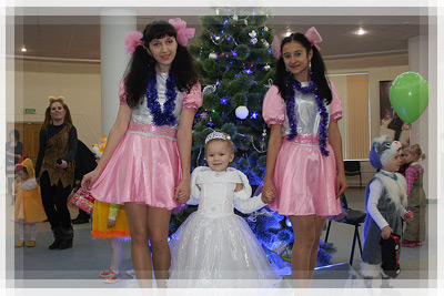 Christmas party for children - Under a decorated Christmas tree Christmas party for children - Under a decorated Christmas tree