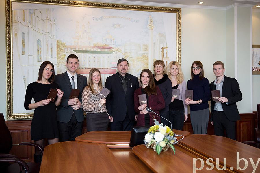 Dmitry Glukhov, Vice-Rector for Science, and Elena Kremneva, Head of Postgraduate Department with postgraduate students D. Glukhov and E. Kremneva with students