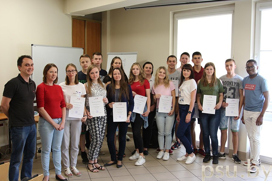 Students with Their Certificates of Course Completion Students with Certificates